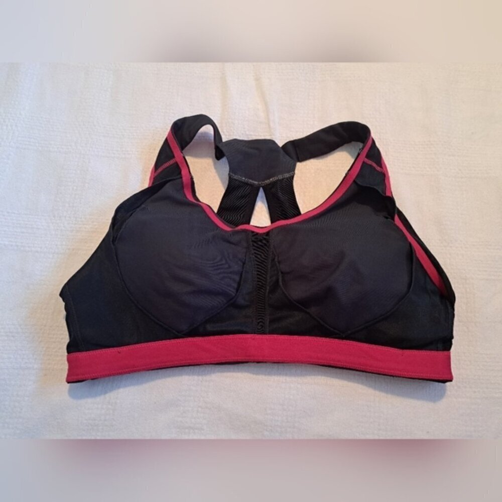 Under Armour women's size 36C black with pink sports bra EUC